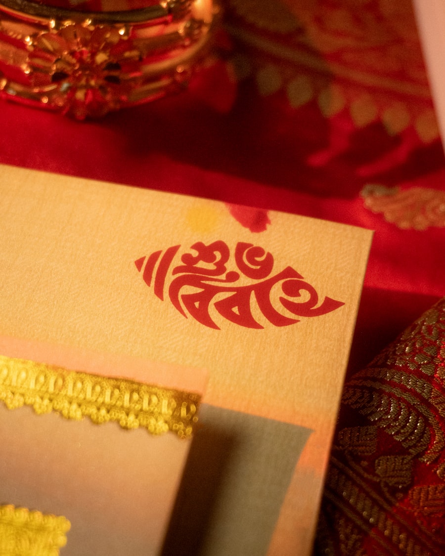 Close-up of calligraphy on a gold wedding invitation card