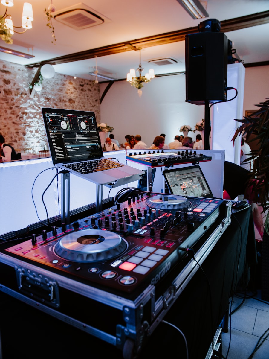 DJ performing at a rustic barn wedding reception