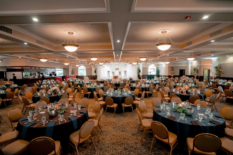 Elegant ballroom with navy and gold table settings